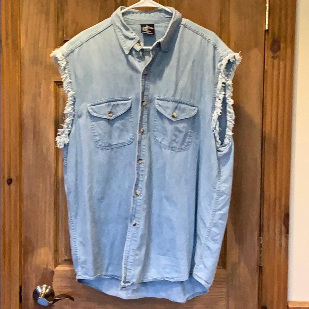 Button down cut off sleeve shirt.